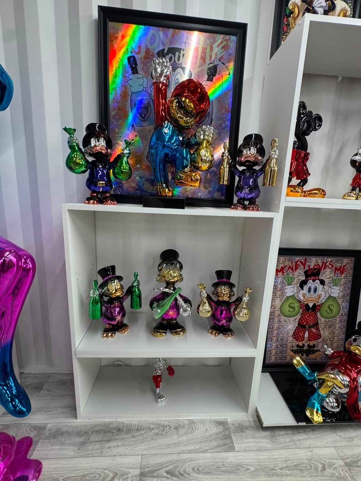 Chrome duck sculptures collection