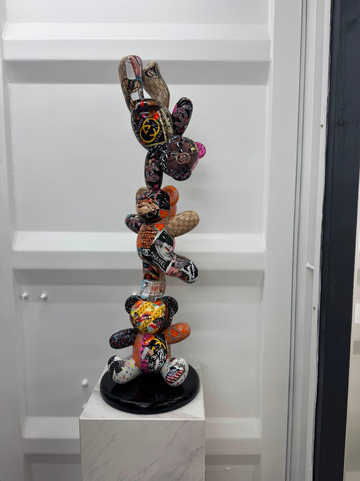 Stacked luxury collage bears sculpture