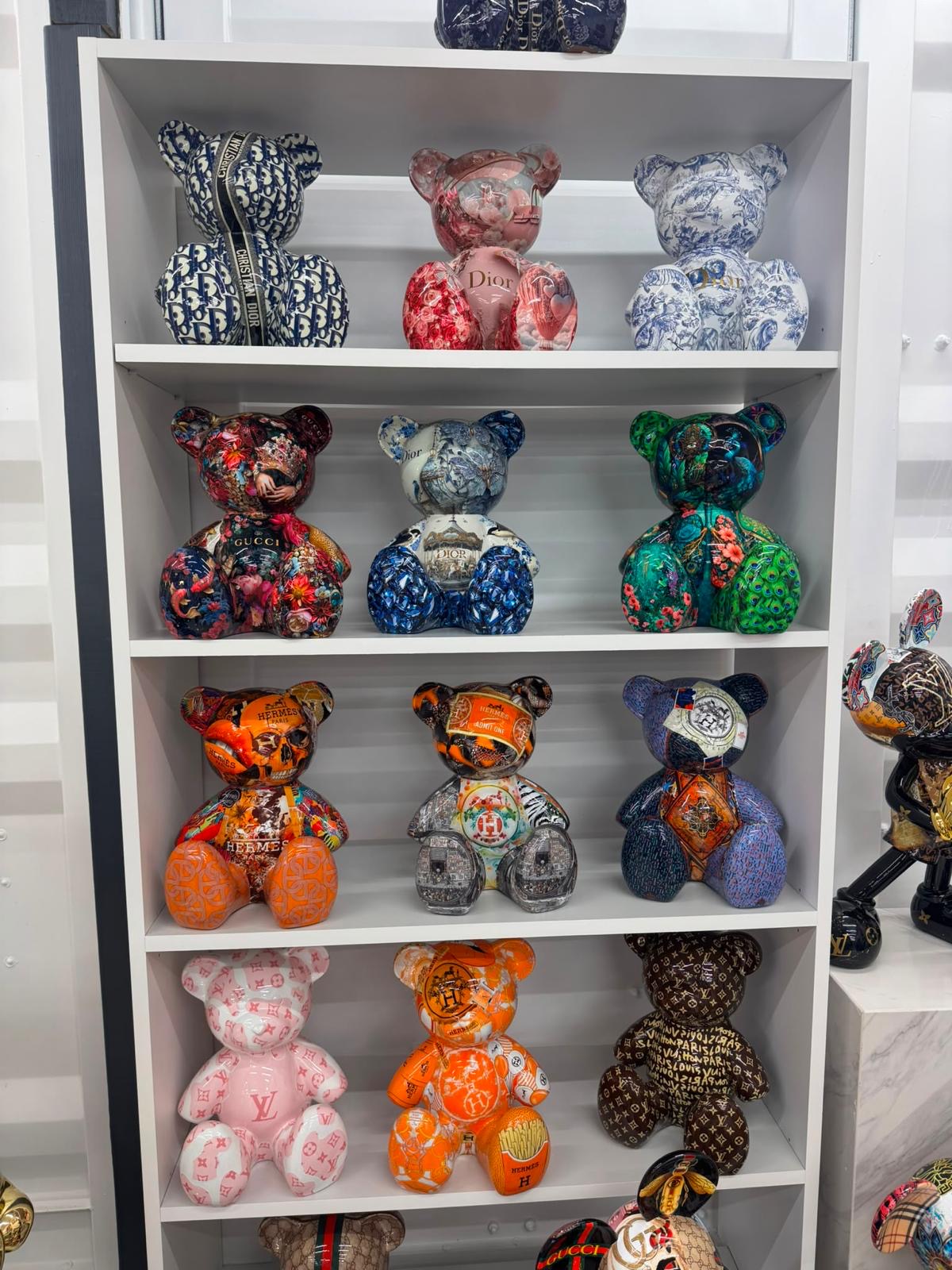 Shelf of luxury collage bear sculptures
